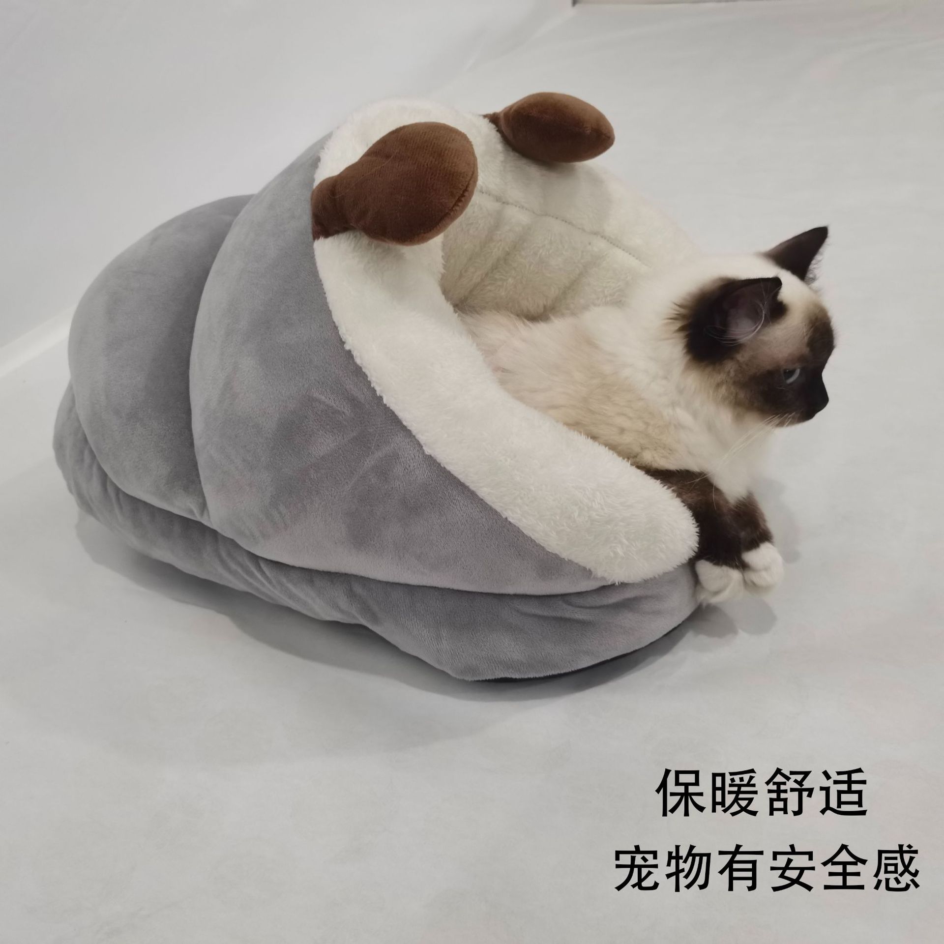 Calming donut dog bed with deep faux fur for anxious dogs